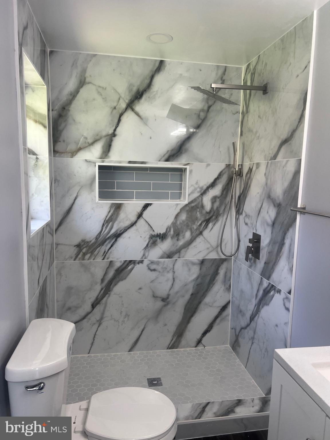 2600 Kingsway Road Fort Washington, MD 20744 - Photo 23 of 37 a bathroom with a toilet and a shower