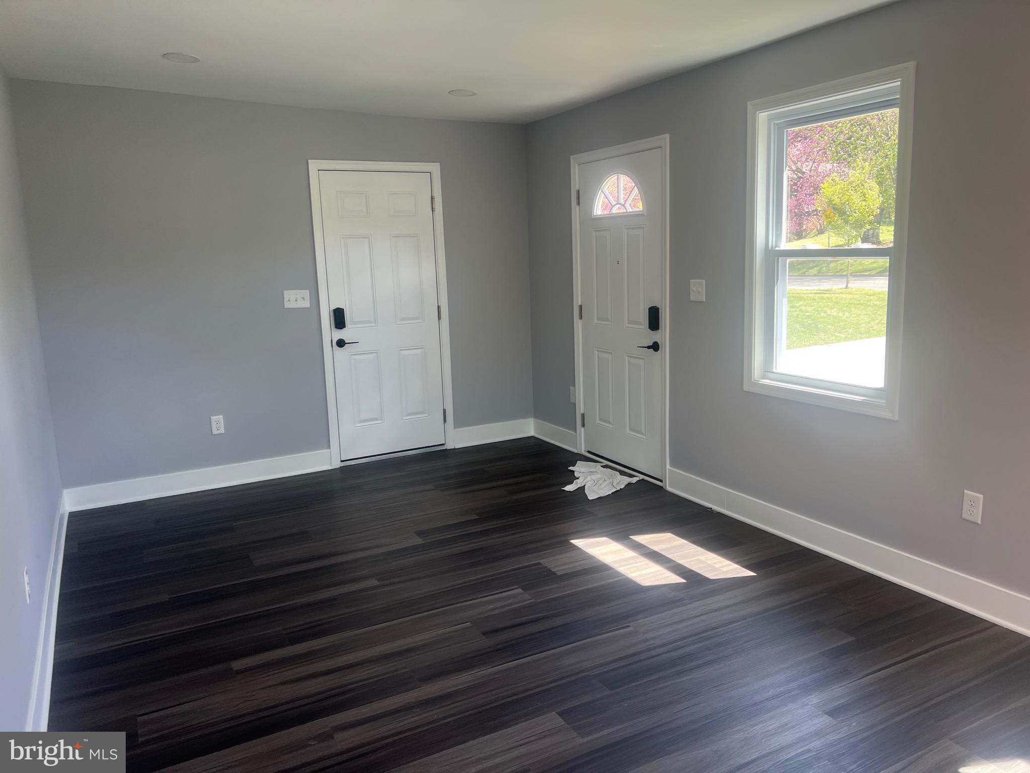 2600 Kingsway Road Fort Washington, MD 20744 - Photo 29 of 37 an empty room with wooden floor and windows