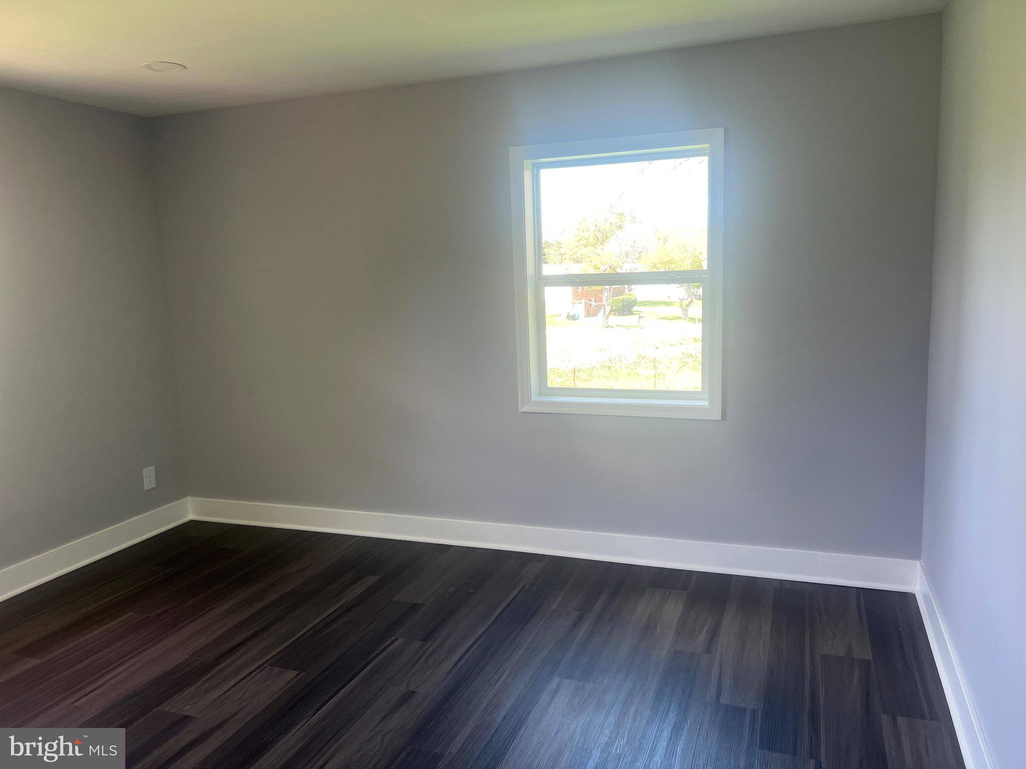 2600 Kingsway Road Fort Washington, MD 20744 - Photo 31 of 37 an empty room with wooden floor and windows