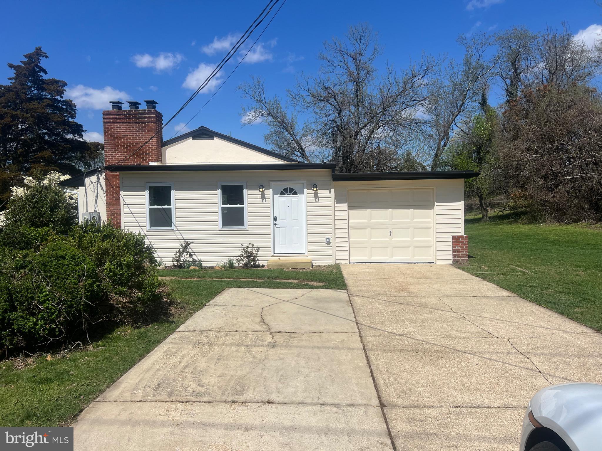 2600 Kingsway Road Fort Washington, MD 20744 - Photo 36 of 37 a view of backyard of house with green space