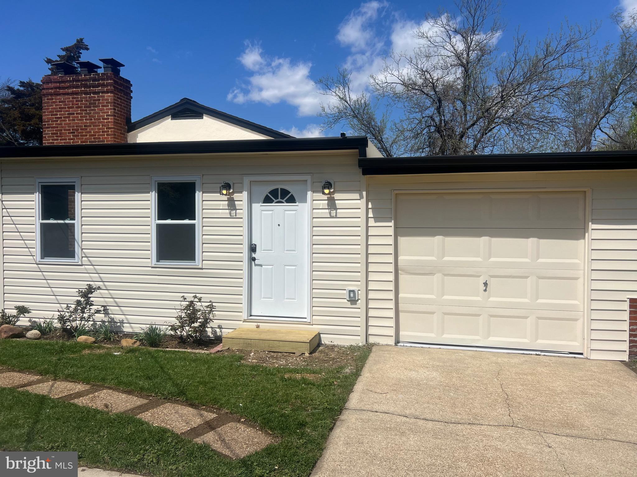 2600 Kingsway Road Fort Washington, MD 20744 - Photo 37 of 37 a front view of a house with a yard and garage