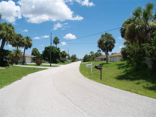a view of a garden with a houses