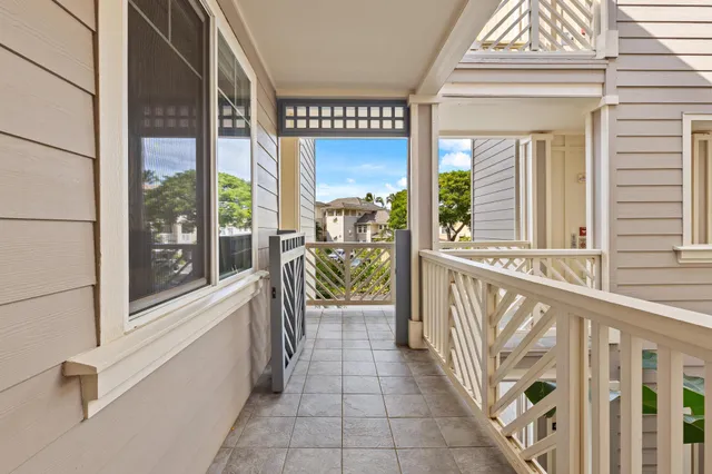 a view of a porch with a furniture