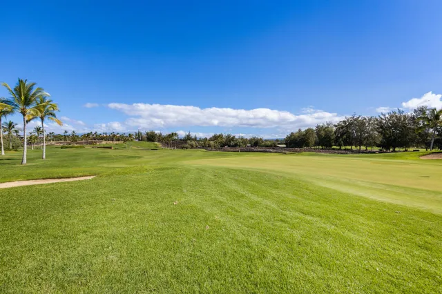 a view of a lake with a mountain in the background