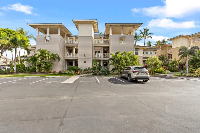 a car parked in front of a building