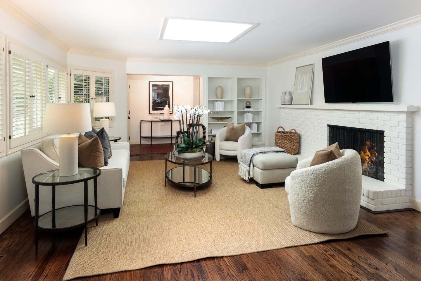 165 Pineview Lane Menlo Park, CA 94025 - Photo 3 of 13 a living room with furniture and a flat screen tv
