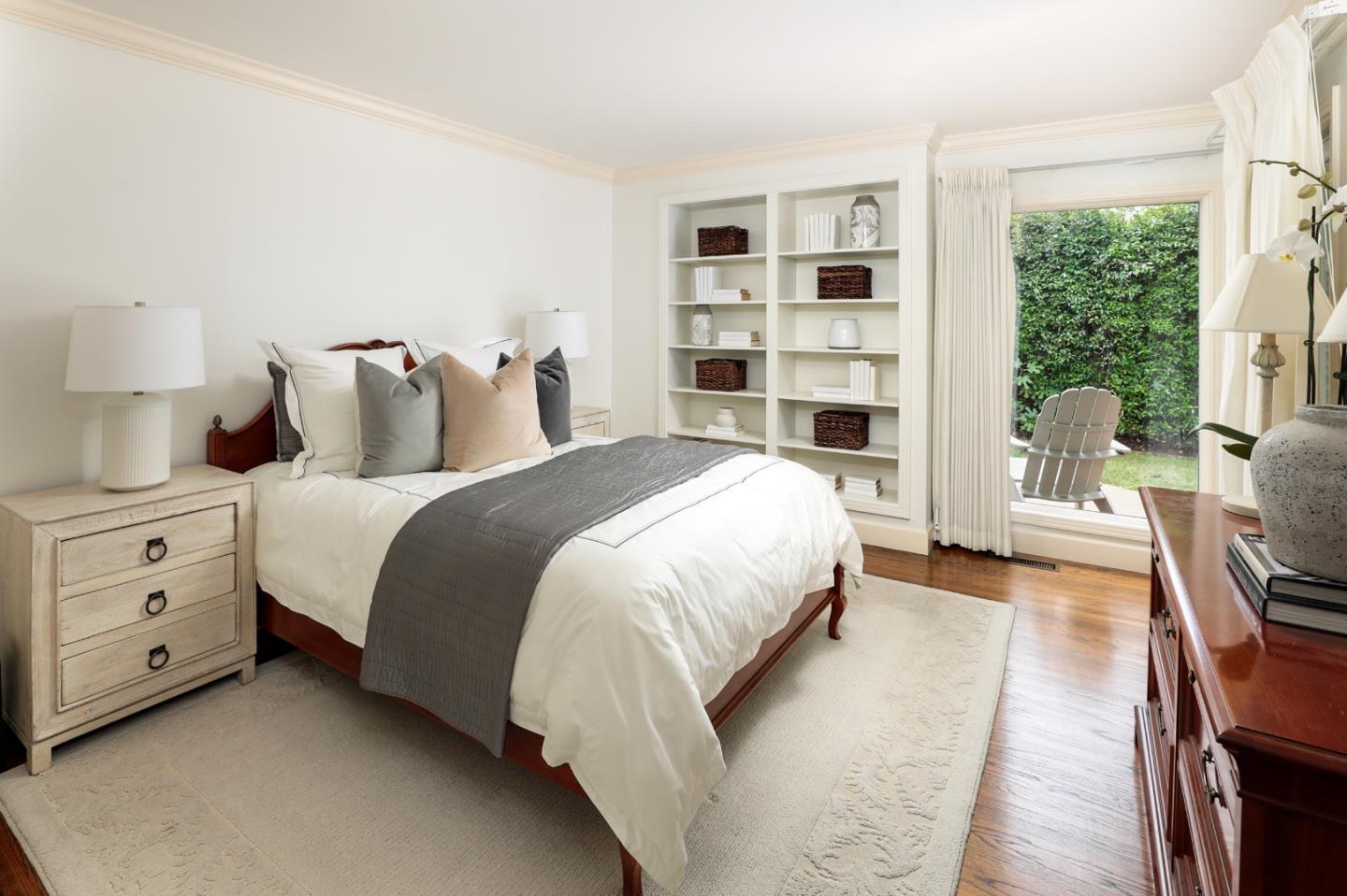 165 Pineview Lane Menlo Park, CA 94025 - Photo 7 of 13 a spacious bedroom with a bed and a large window