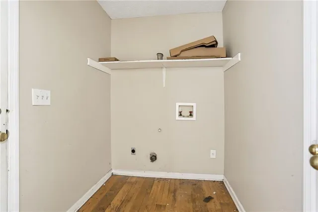 a view of small space with wooden floor