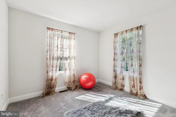 a view of a room with windows
