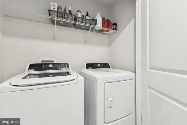 a view of an empty room with stairs