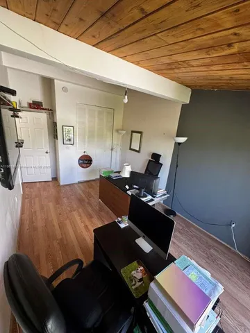 a bed room with a bed and furniture