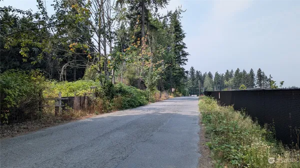 a view of a lake with a building in the background