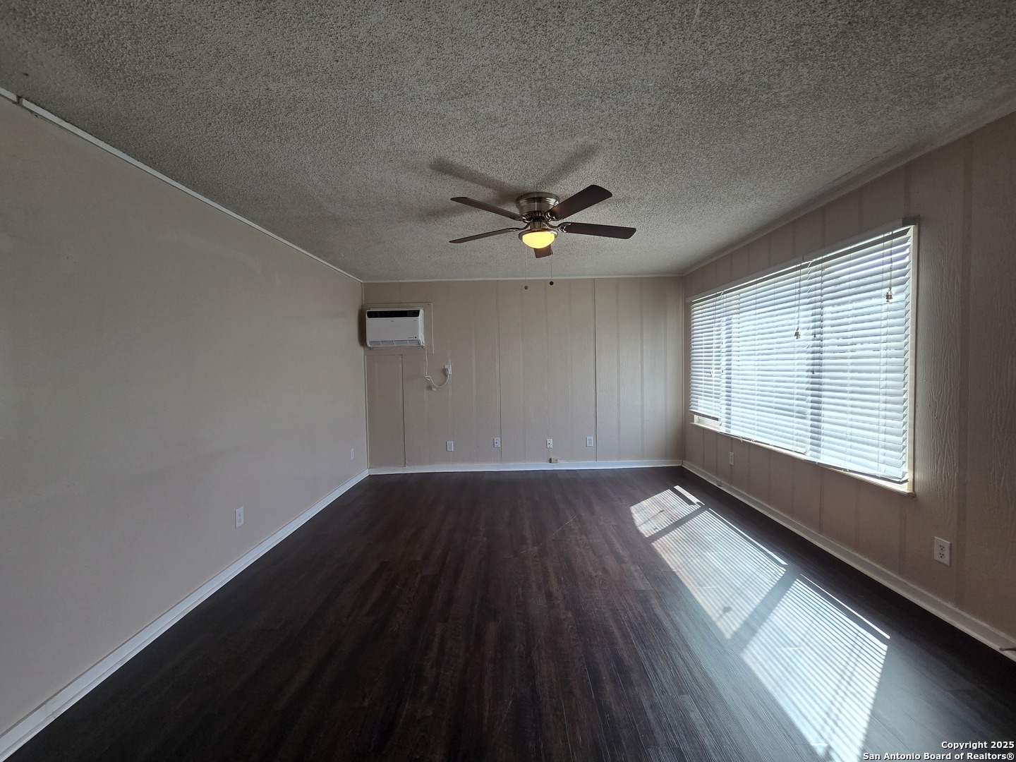 1484 West Klein Road New Braunfels, TX 78130 - Photo 5 of 11 a view of an empty room with a window
