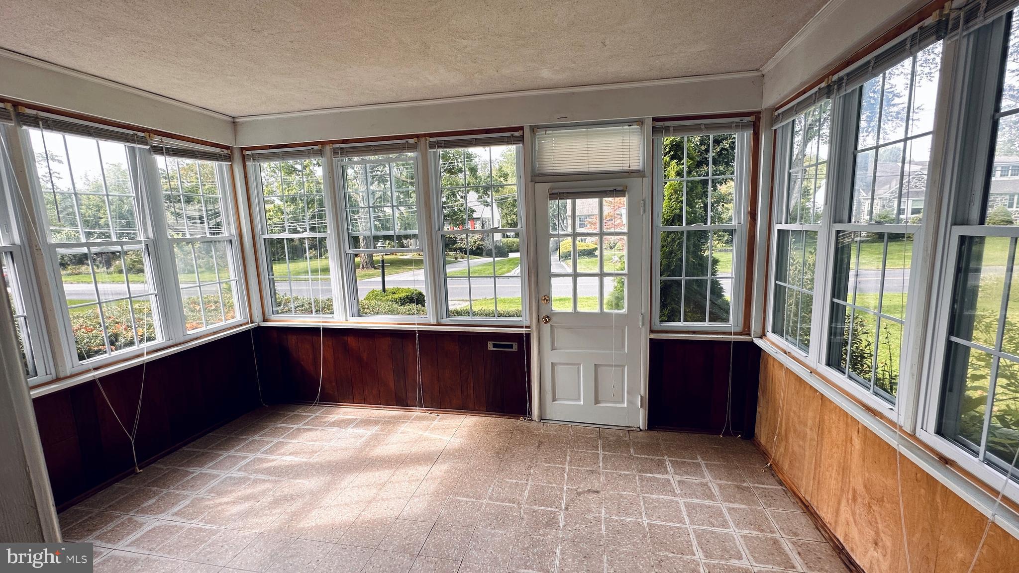 1128 Morris Road Wynnewood, PA 19096 - Photo 8 of 24 Front enclosed patio
