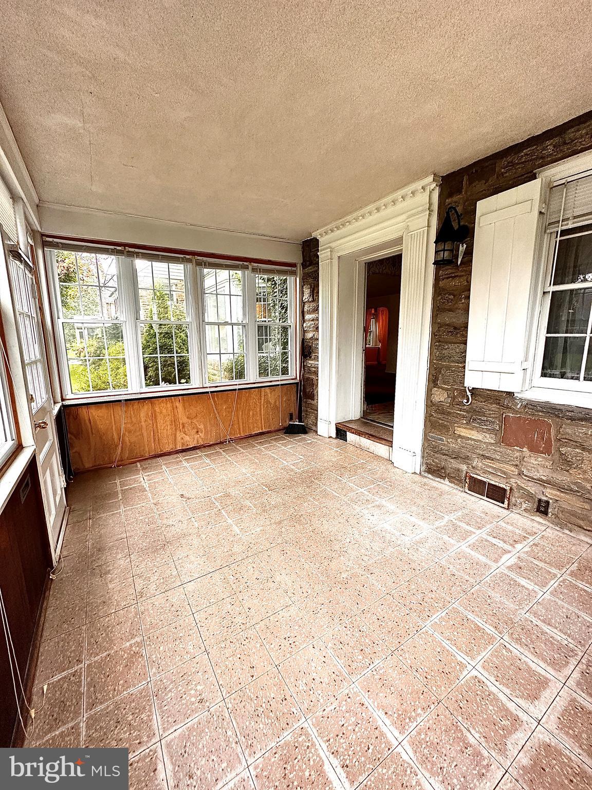 1128 Morris Road Wynnewood, PA 19096 - Photo 9 of 24 Front enclosed patio