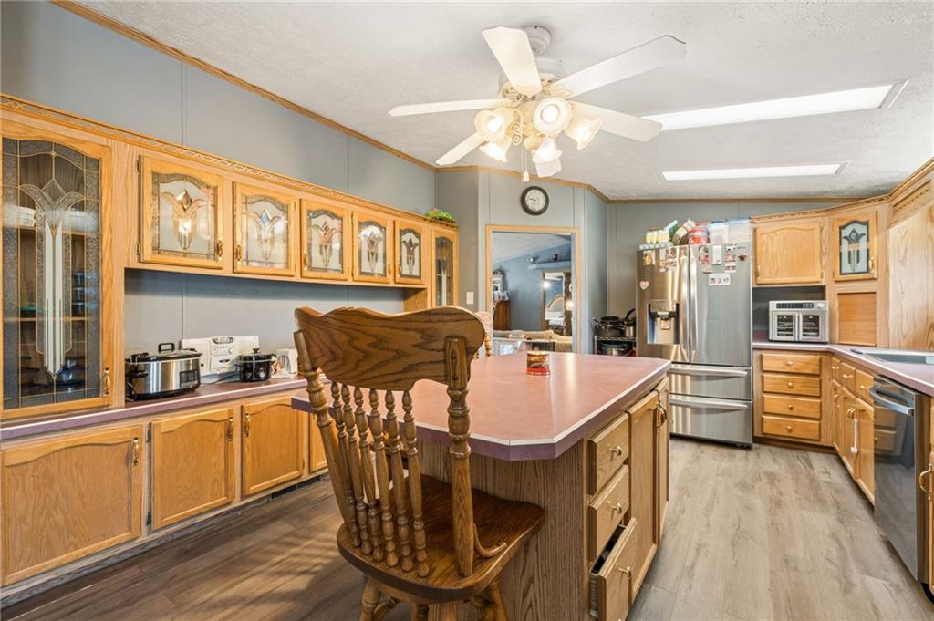 275 Adamik Road Clarksville, PA 15322 - Photo 16 of 39 a very nice looking kitchen with furniture and wooden floor