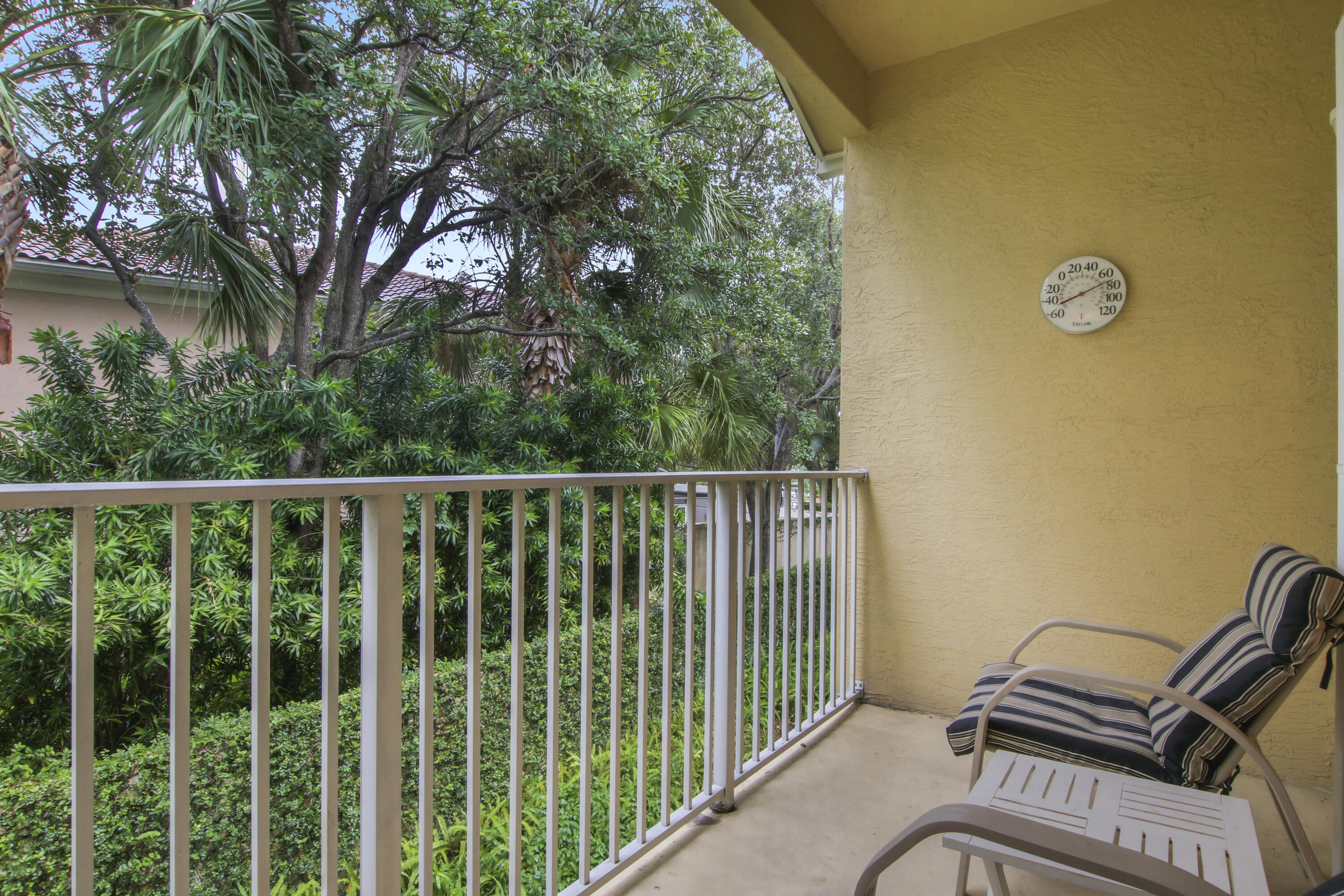 108 Lighthouse Circle, Unit B Jupiter, FL 33469 - Photo 27 of 33 a view of a balcony with chairs