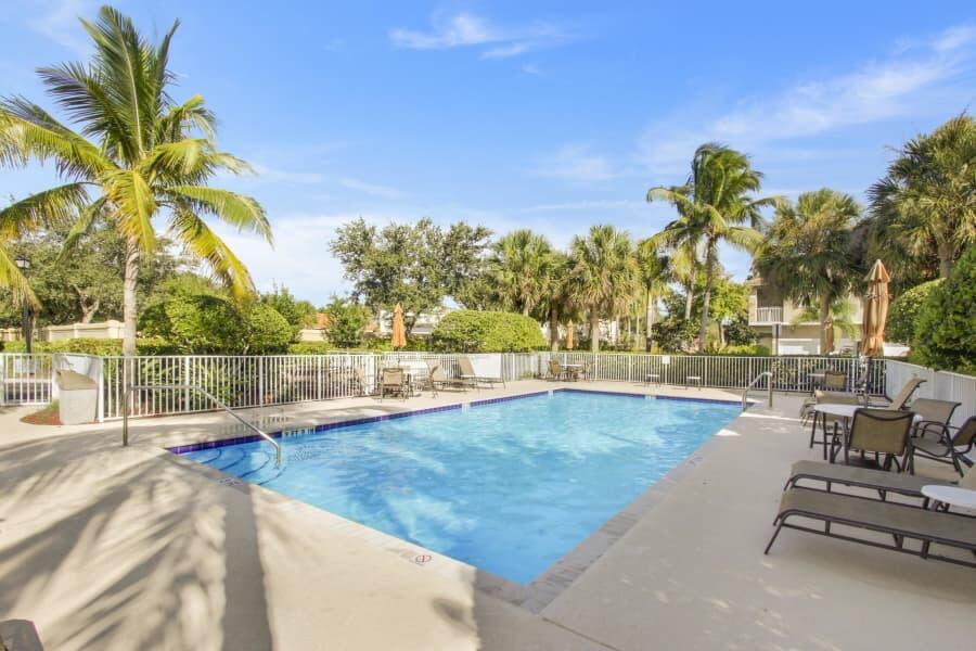 108 Lighthouse Circle, Unit B Jupiter, FL 33469 - Photo 28 of 33 a view of swimming pool with outdoor seating