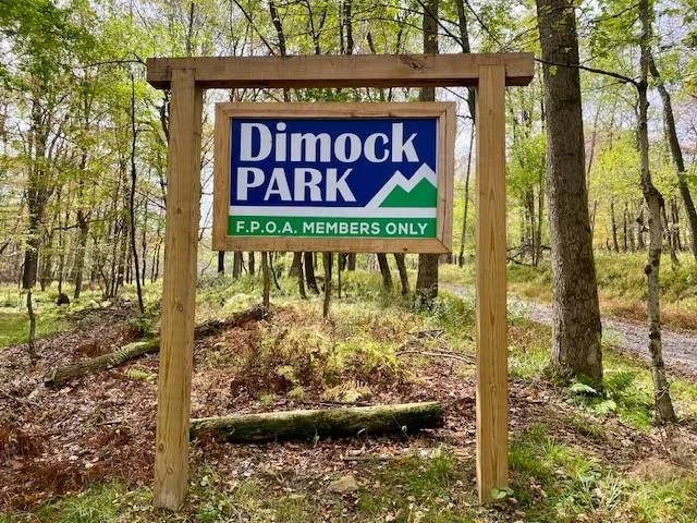 a sign on the side of the road