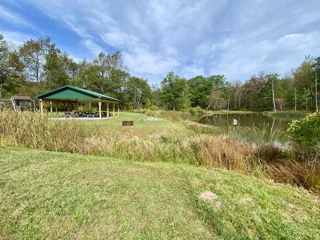 a view of a lake with a big yard