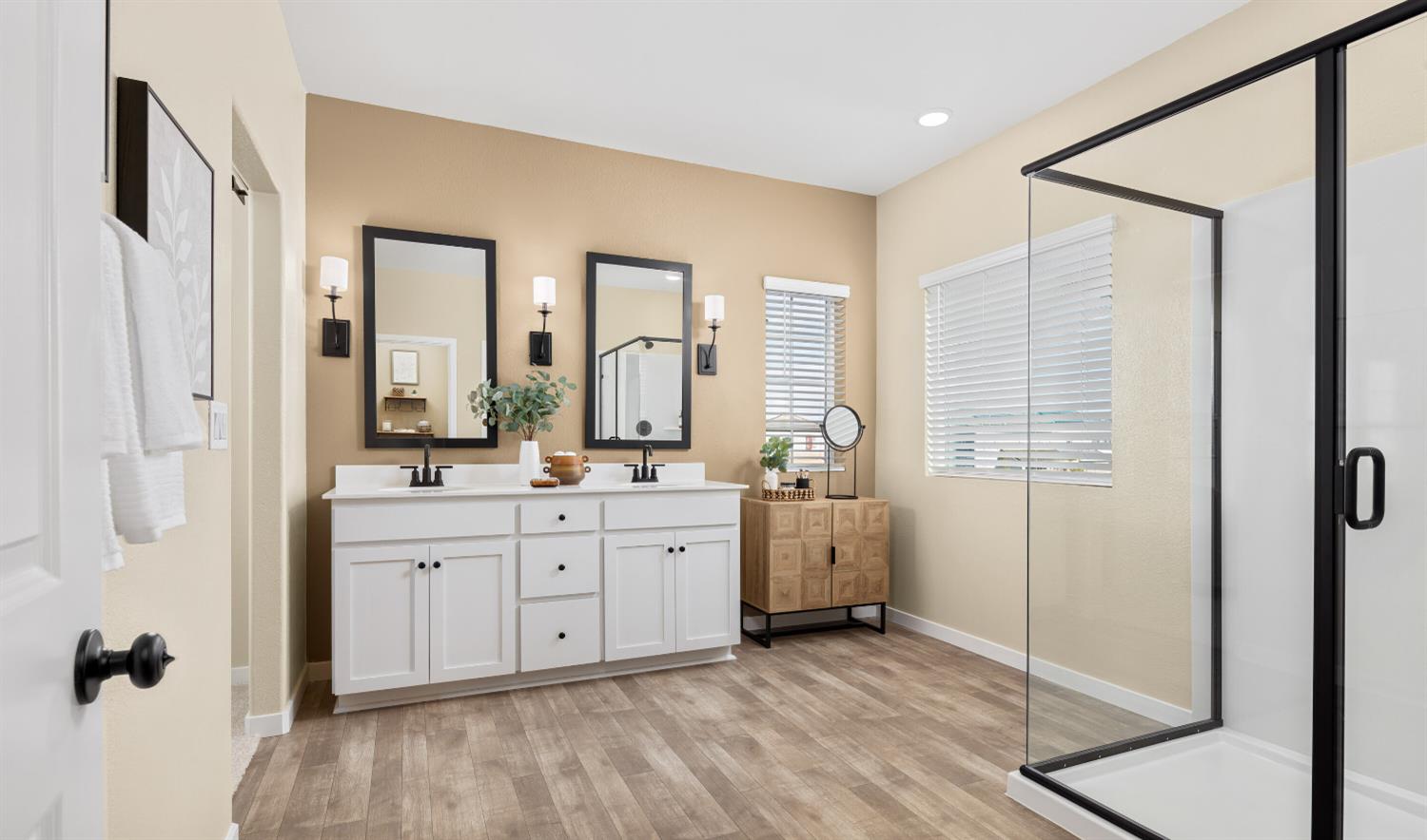 12254 Goldfinch Way Rancho Cordova, CA 95742 - Photo 19 of 19 a spacious bathroom with a double vanity sink a mirror and a bathtub