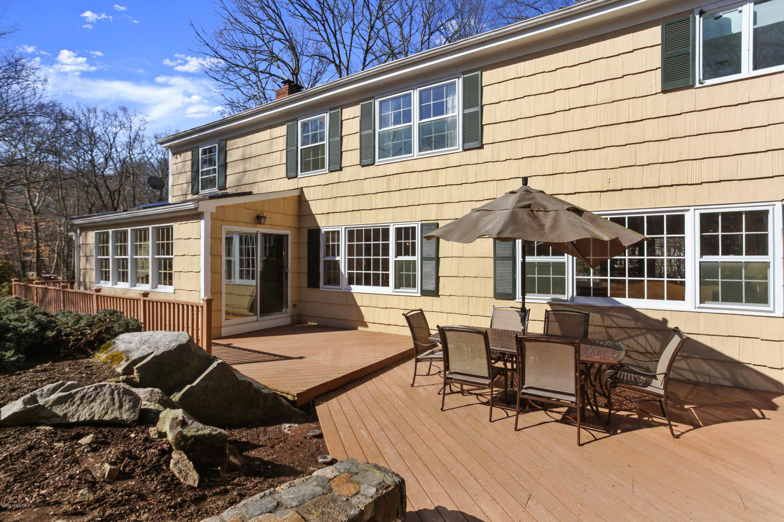31 Horseshoe Road Cos Cob, CT 06807 - Photo 25 of 34 back of house from deck