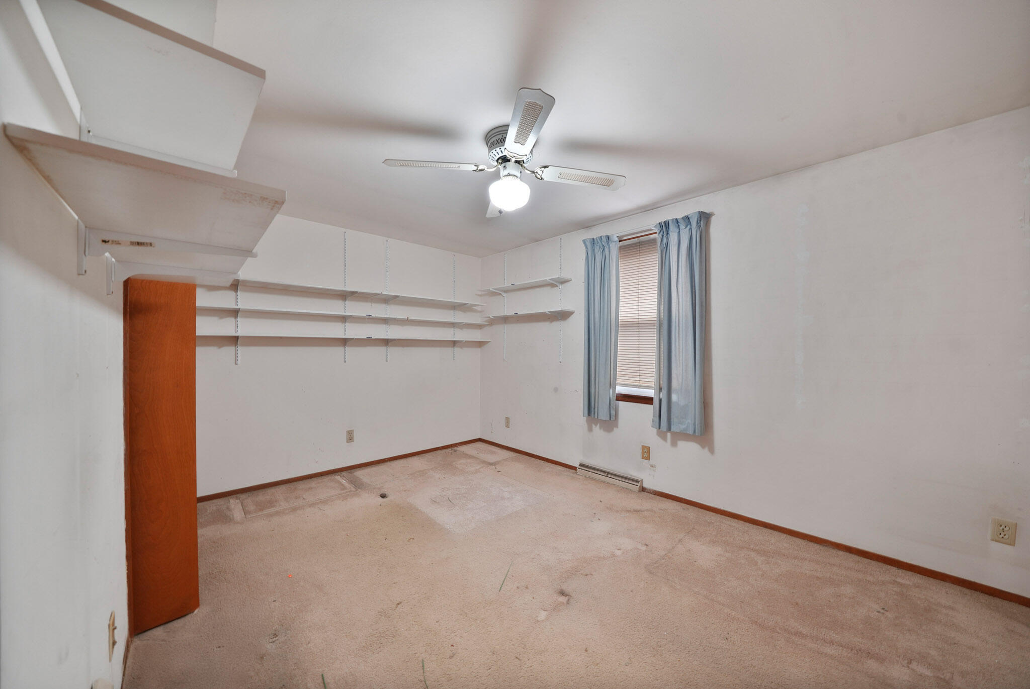 756 South 375 West Hebron, IN 46341 - Photo 11 of 21 an empty room with windows and fan