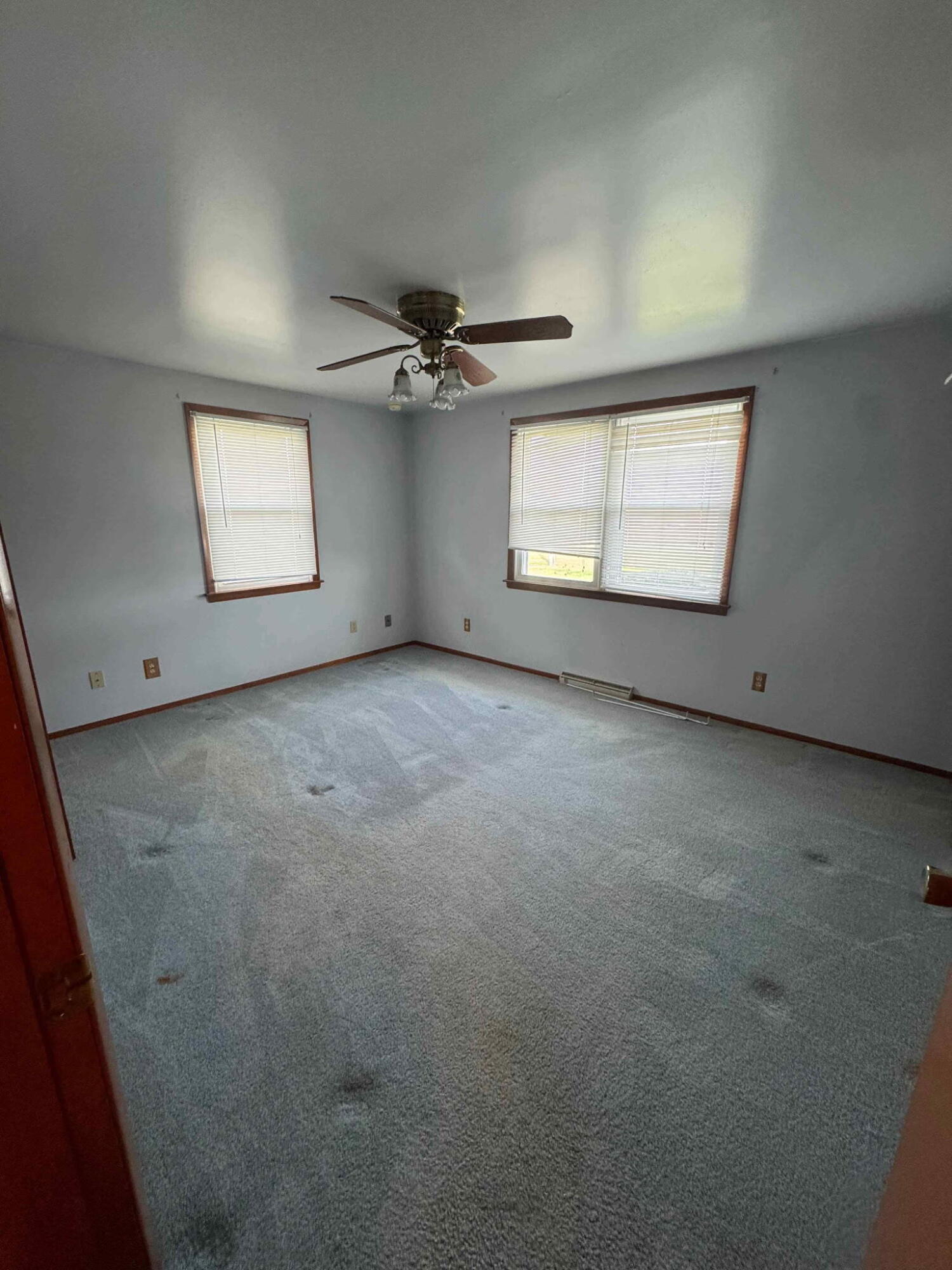 756 South 375 West Hebron, IN 46341 - Photo 14 of 21 an empty room with windows and ceiling fan