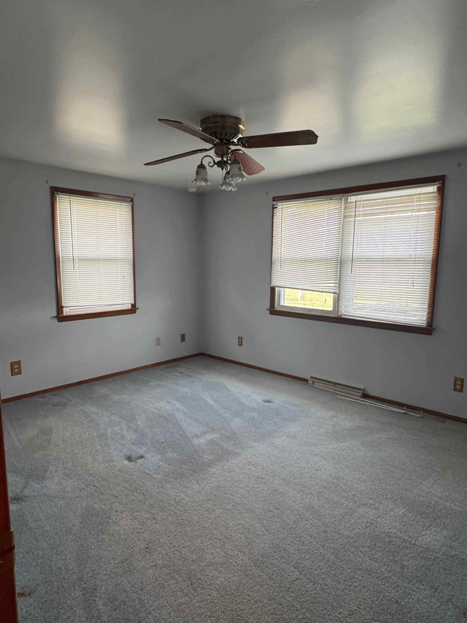 756 South 375 West Hebron, IN 46341 - Photo 15 of 21 an empty room with a window and a ceiling fan