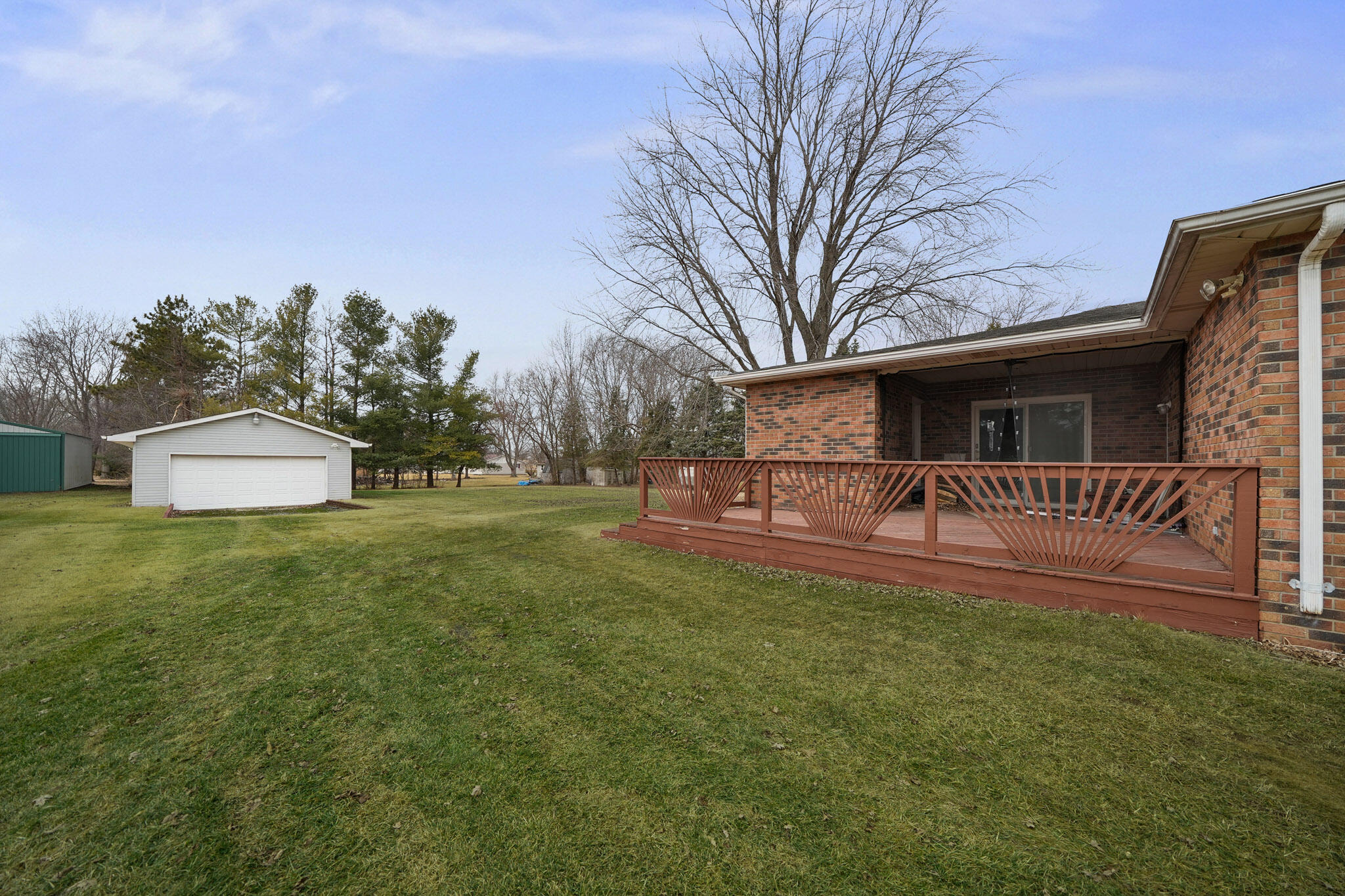 756 South 375 West Hebron, IN 46341 - Photo 18 of 21 a front view of a house with a yard and a garage