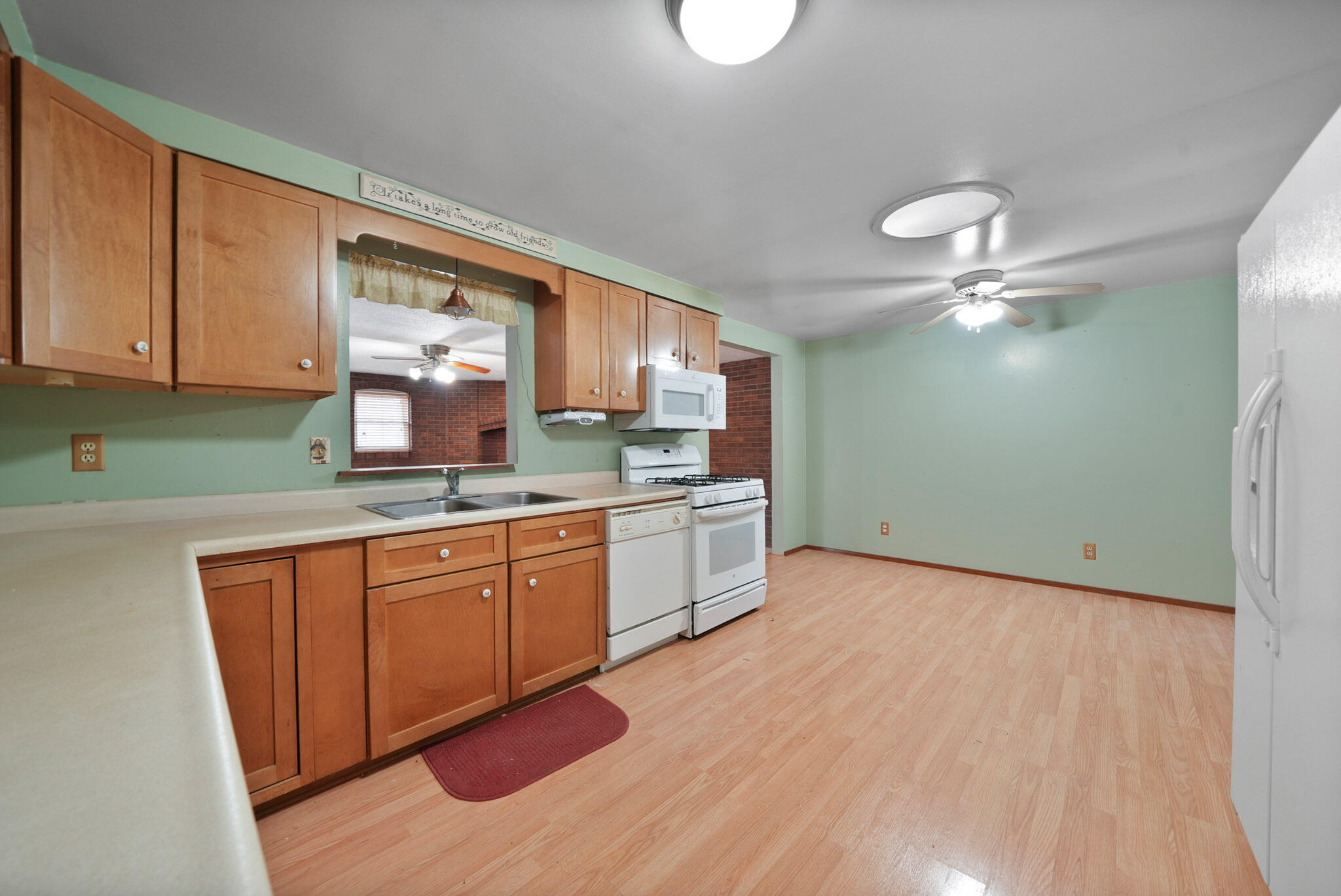 756 South 375 West Hebron, IN 46341 - Photo 2 of 21 a kitchen with a sink cabinets and window
