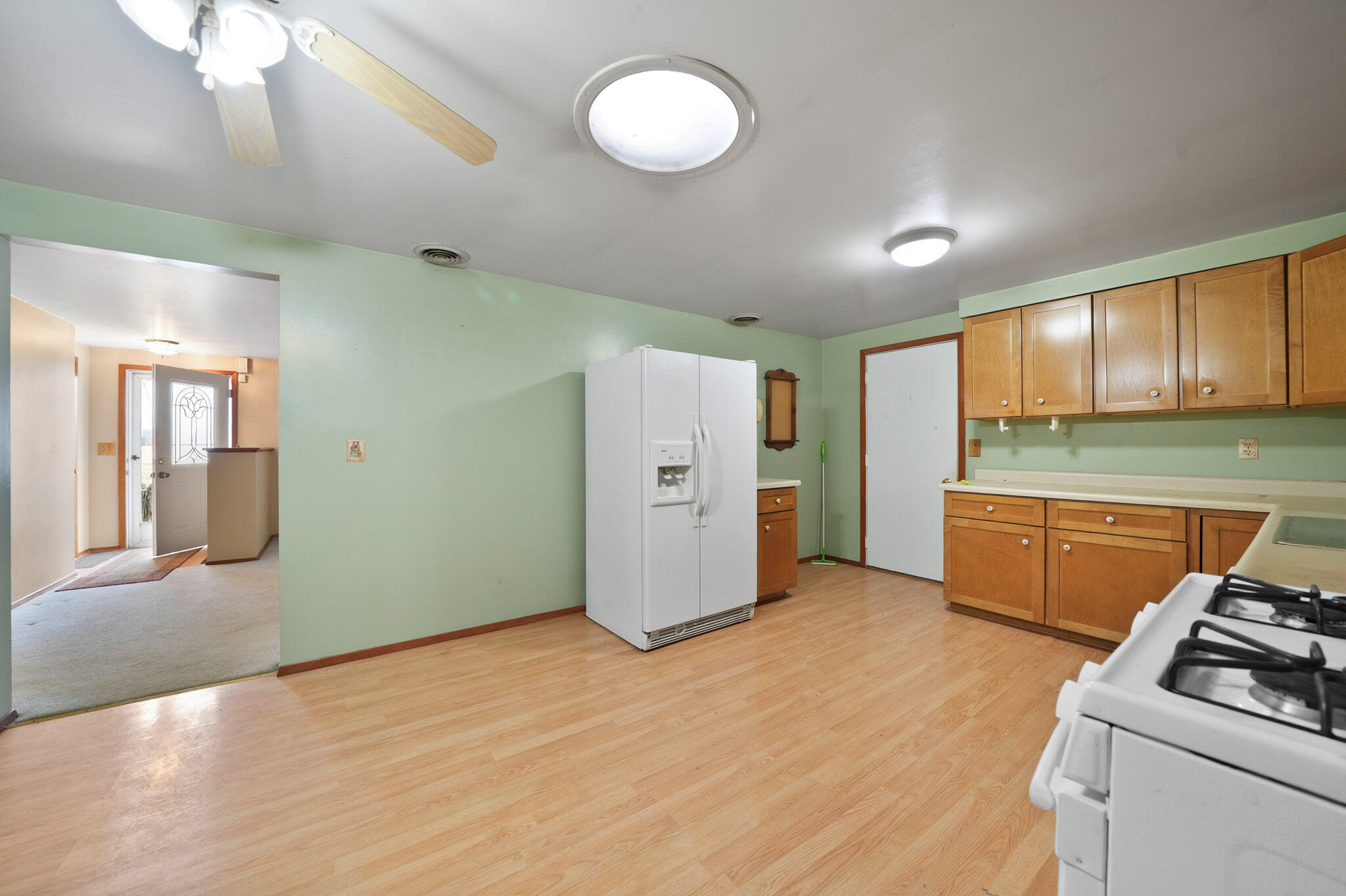 756 South 375 West Hebron, IN 46341 - Photo 3 of 21 a kitchen with stainless steel appliances granite countertop a stove a sink and a refrigerator