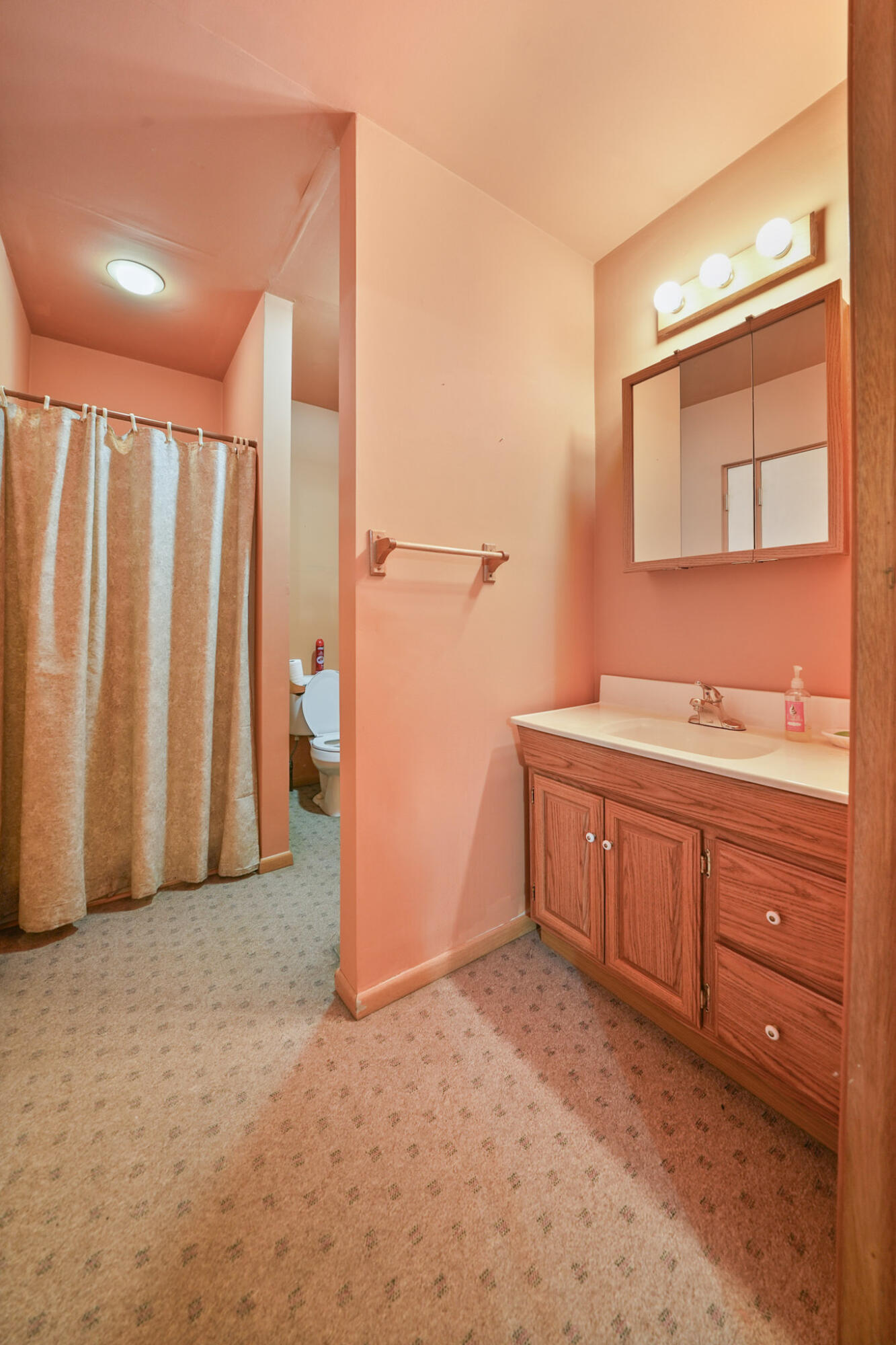 756 South 375 West Hebron, IN 46341 - Photo 10 of 21 a bathroom with a granite countertop sink and a mirror