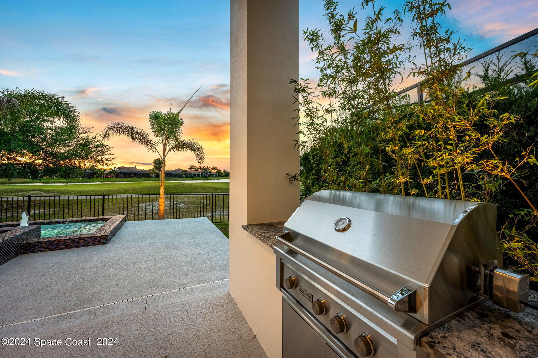 6374 Modern Duran Drive Melbourne, FL 32940 - Photo 31 of 55 a view of a couches in a patio with a yard