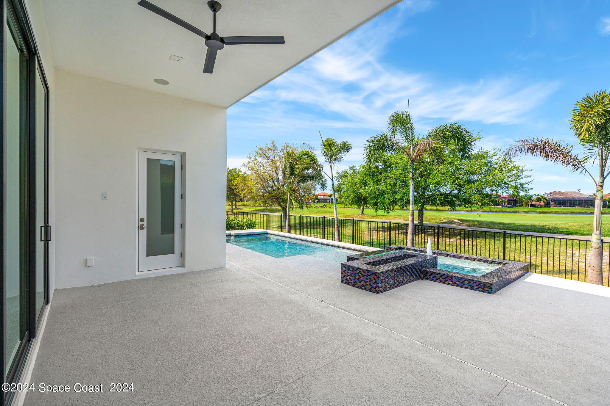 6374 Modern Duran Drive Melbourne, FL 32940 - Photo 32 of 55 a view of swimming pool with a patio