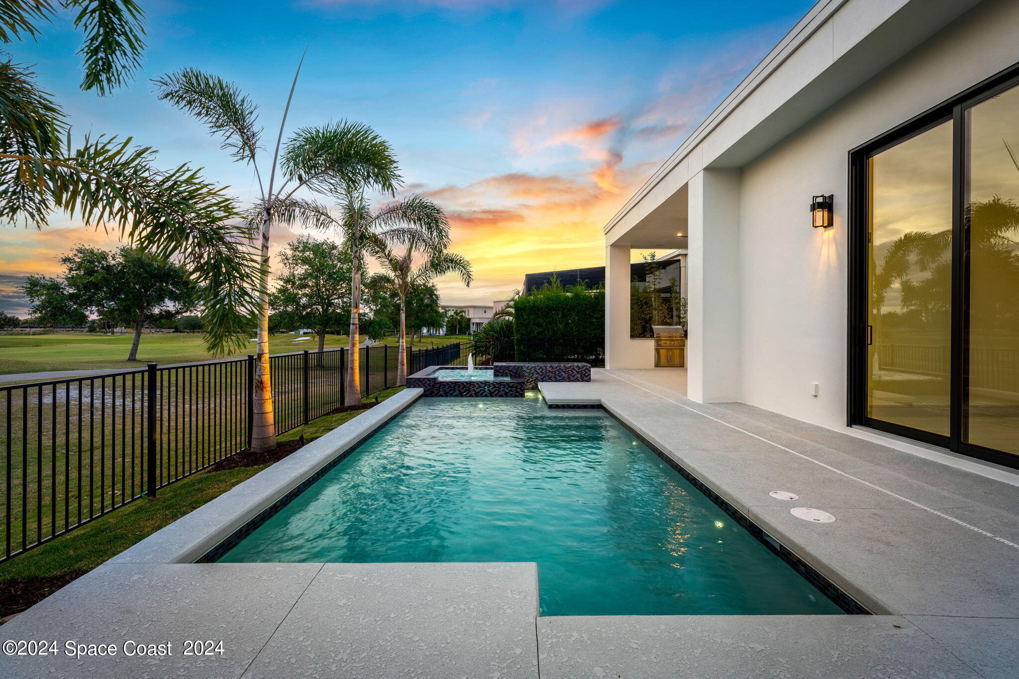 6374 Modern Duran Drive Melbourne, FL 32940 - Photo 36 of 55 a view of a porch with a backyard