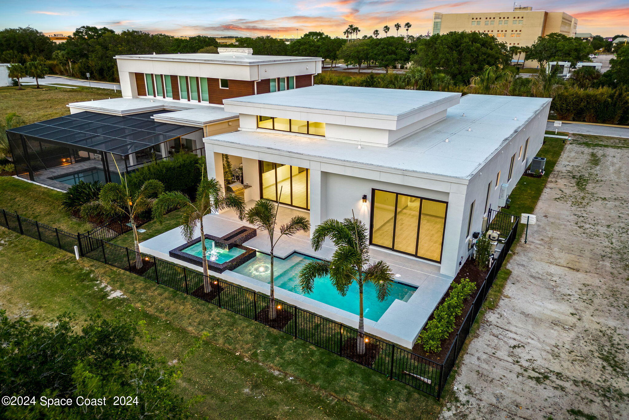 6374 Modern Duran Drive Melbourne, FL 32940 - Photo 46 of 55 an aerial view of a house with a yard