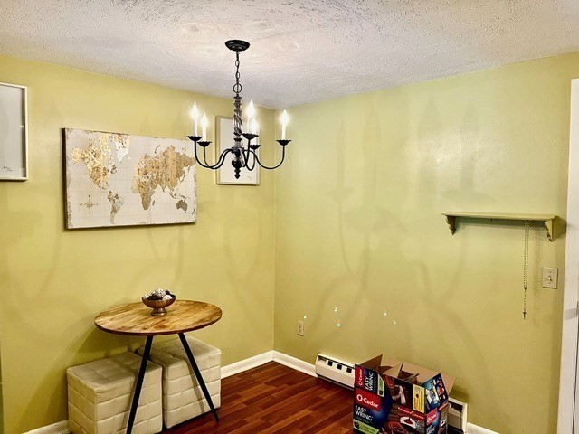 41 Leonard Road, Unit 41 Boxborough, MA 01719 - Photo 4 of 7 a view of a room with a table and chairs