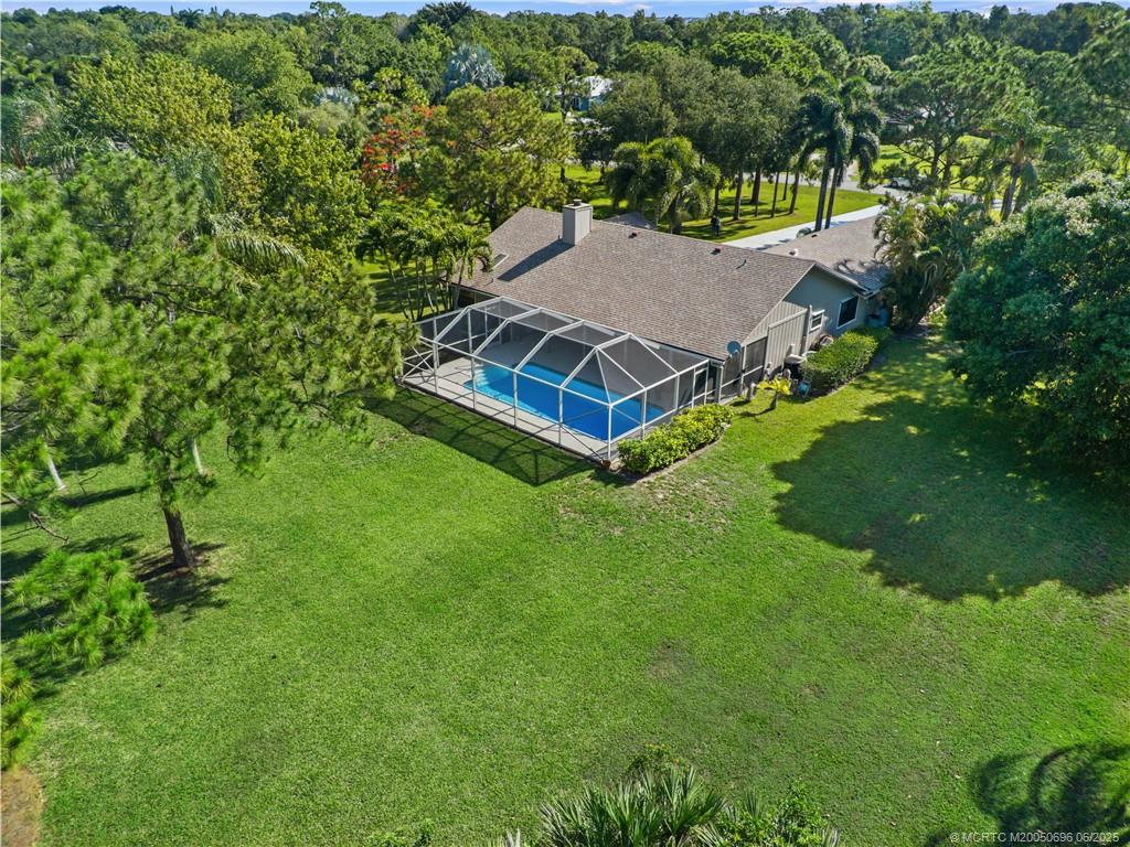 5692 Southeast Lamay Drive Stuart, FL 34997 - Photo 2 of 28 an aerial view of a house