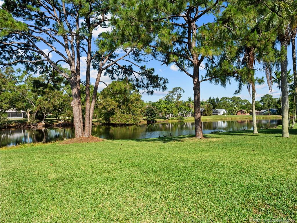 5692 Southeast Lamay Drive Stuart, FL 34997 - Photo 26 of 28 a view of a park with large trees