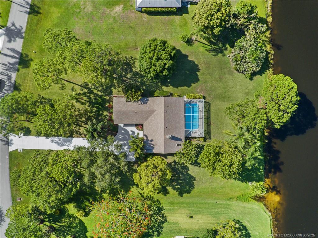 5692 Southeast Lamay Drive Stuart, FL 34997 - Photo 28 of 28 a view of a garden