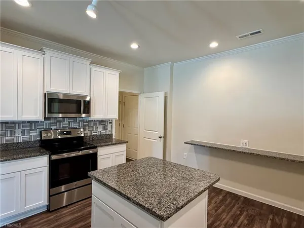 $325,000 | 6548 Donahue Drive, Whitsett, NC 27377