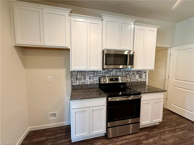 $335,000 | 6548 Donahue Drive, Whitsett, NC 27377