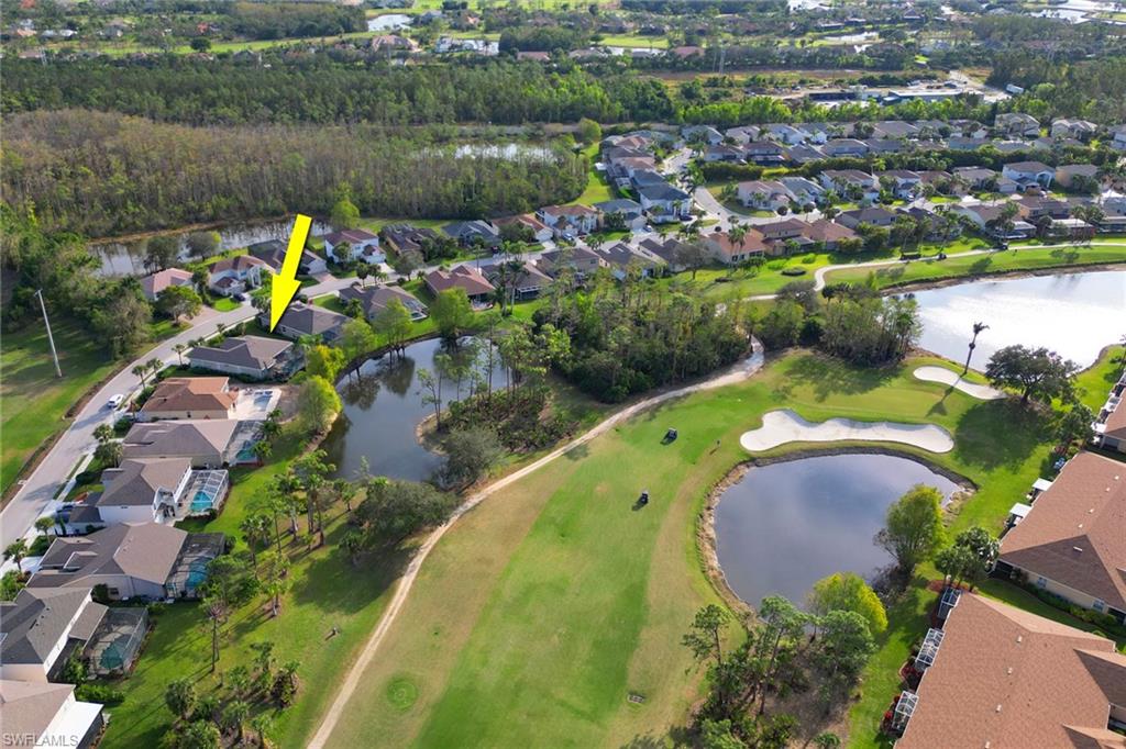 21156 Braxfield Loop Estero, FL 33928 - Photo 2 of 43 an aerial view of a house with a lake view