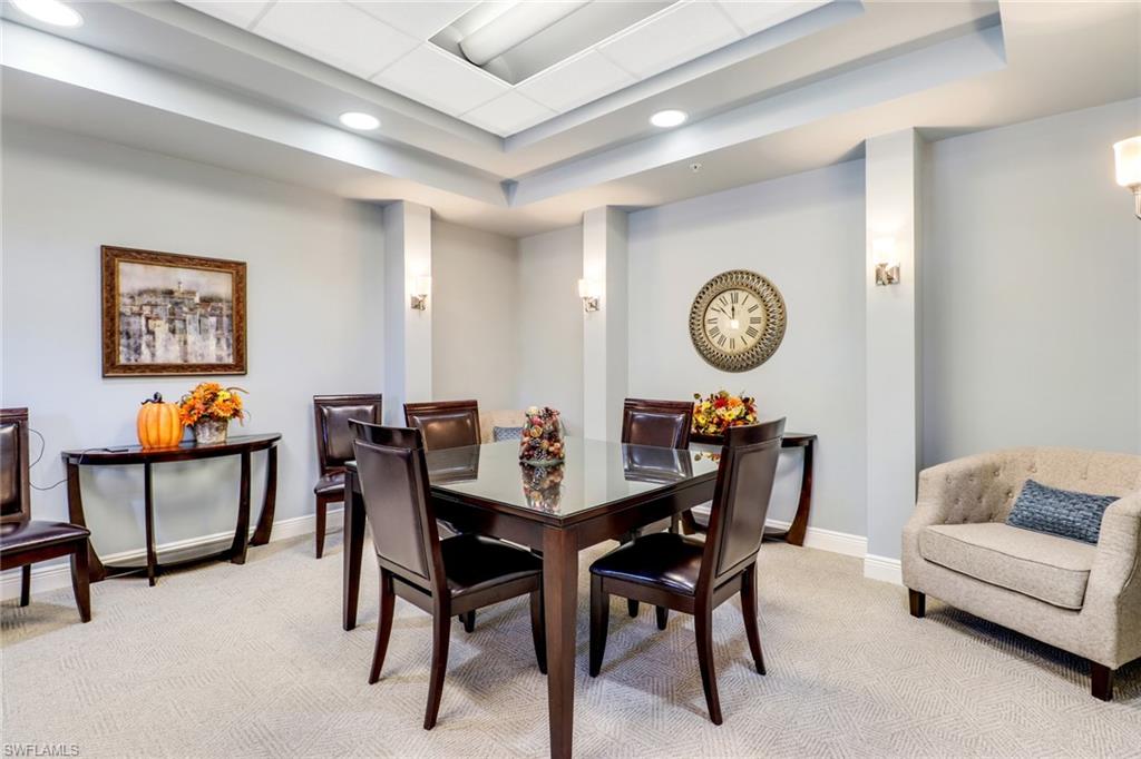 21156 Braxfield Loop Estero, FL 33928 - Photo 30 of 43 a view of a dining room that has a table and a chair