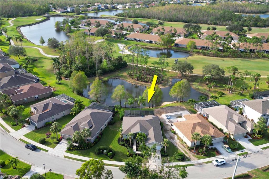 21156 Braxfield Loop Estero, FL 33928 - Photo 43 of 43 an aerial view of residential house with outdoor space and lake view