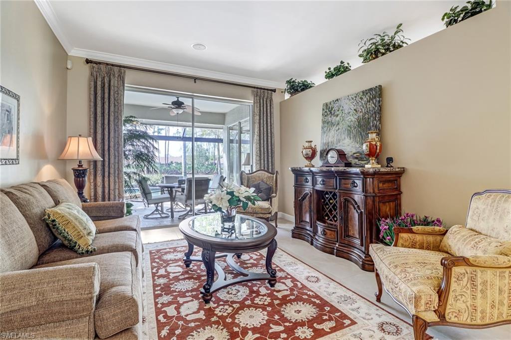 21156 Braxfield Loop Estero, FL 33928 - Photo 5 of 43 a living room with furniture and a large window