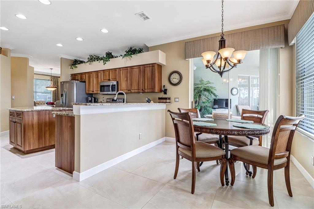 21156 Braxfield Loop Estero, FL 33928 - Photo 10 of 43 a view of a dining room and livingroom view