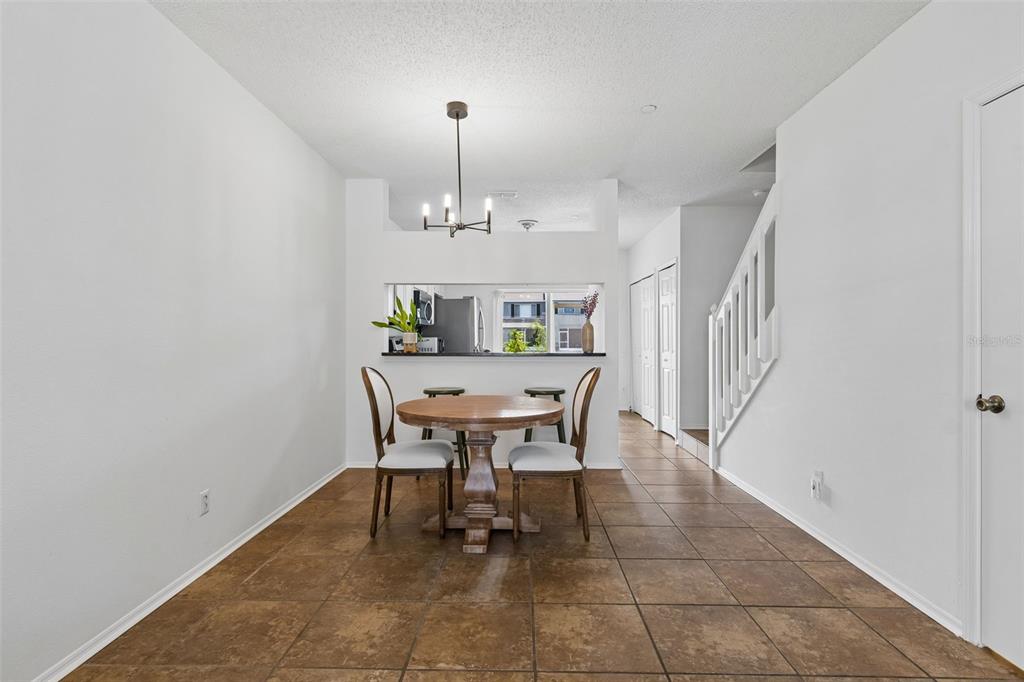 382 Countryside Key Boulevard Oldsmar, FL 34677 - Photo 9 of 58 a view of a dining room with furniture