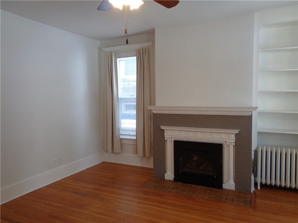 164 Pine Street, Unit 102 Corning, NY 14830 - Photo 3 of 10 Living Room - with a working gas fireplace
